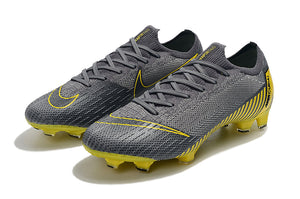 CHUTEIRA NIKE MERCURIAL VAPOR 12 FG ELITE "GAME OVER" CINZA/AMARELO