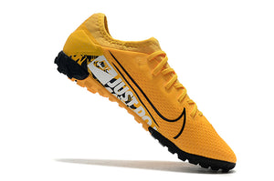 CHUTEIRA NIKE MERCURIAL VAPOR 13 TF AMARELO/PRETO